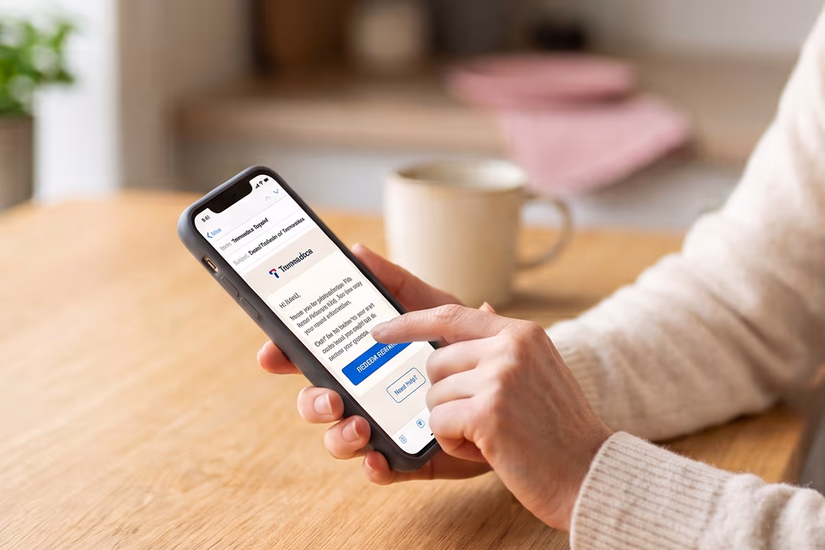 woman-using-phone-redeeming-gift